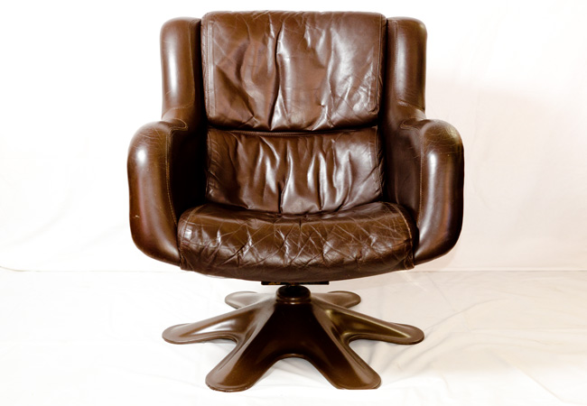 Landscape, front view of a brown leather 418 Armchair by Yrjö Kukkapuro